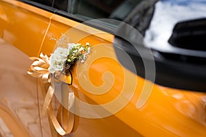 Wedding car.Wedding decoration on wedding car. Luxury wedding car decorated with flowers