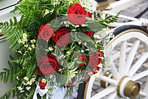 Wedding Carriage With Huge Bouquet On Side photo