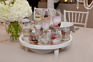 Wedding catering food, cakes in champagne glasses