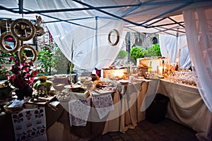 Wedding catering table with different food at night outdoor.