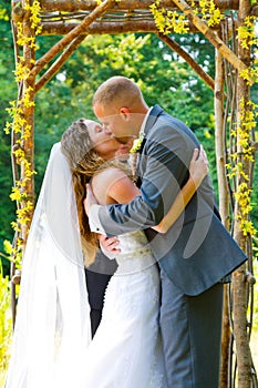 Wedding Ceremony Bride and Groom Kiss