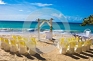 Wedding ceremony chairs and decorations on the beach shore