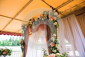 Wedding ceremony decoration, wedding arch of flowers.