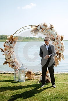 wedding ceremony of the newlyweds on the pier