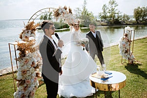 wedding ceremony of the newlyweds on the pier