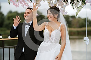 wedding ceremony of the newlyweds on the pier