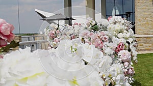 Wedding ceremony. The place of the wedding ceremony is decorated with many flowers, the place of wedding cerimony
