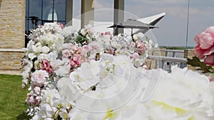 Wedding ceremony. The place of the wedding ceremony is decorated with many flowers, the place of wedding cerimony