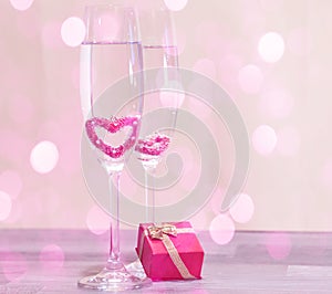 Wedding champagne glasses, romantic heart background