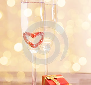 Wedding champagne glasses, romantic heart background