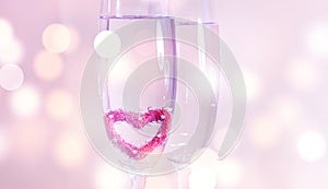 Wedding champagne glasses, romantic heart background