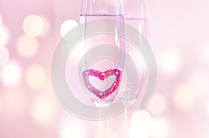 Wedding champagne glasses, romantic heart background