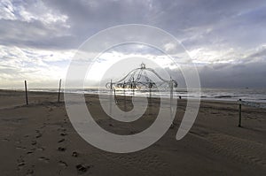 Wedding chapel and location on the beach in Greece. The metal frame provides the perfect backdrop for wedding photos with sand and