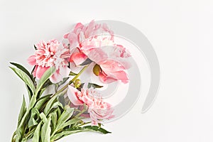 wedding concept. bouquet of peonies close-up on a white background. the layout of the summer Invitational
