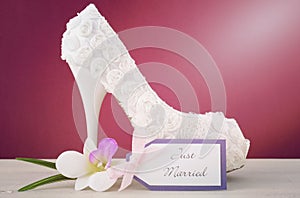 Wedding concept high heel shoe on marsala background.