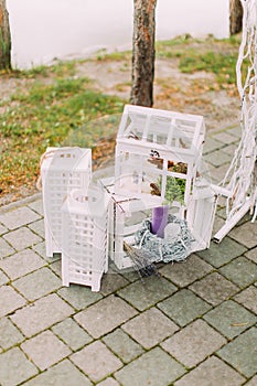 Wedding concept. Vintage wooden crates with lovely candles and little elements. photo