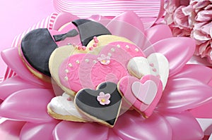 Wedding cookies on pink bridal table - closeup.
