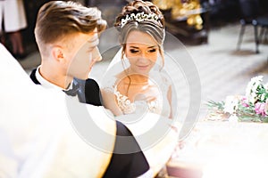 Wedding couple bide and groom get married in a church photo