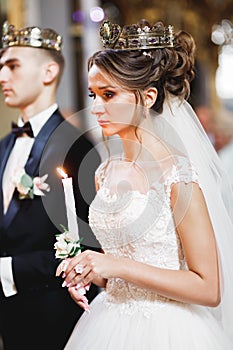 Wedding couple bide and groom get married in a church photo