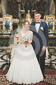 Wedding couple bide and groom get married in a church photo