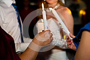 Wedding couple and candle