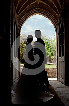 Wedding couple in church entrance