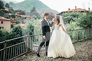 Wedding couple dancing against the backdrop of the city