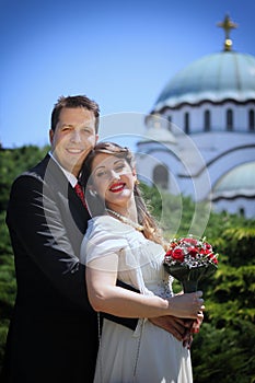 Wedding couple in front of the Temple of Saint Sava