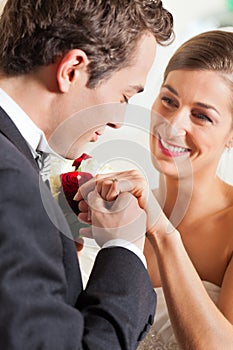 Wedding couple giving promise of marriage