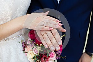 Wedding couple hands with wedding rings