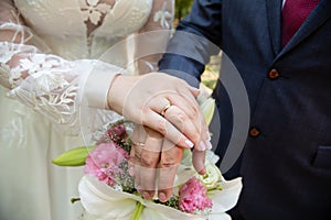 Wedding couple hands with wedding rings