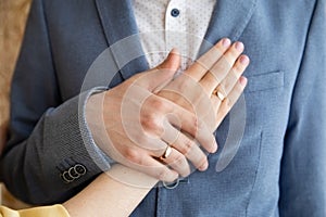 Wedding couple hands with wedding rings