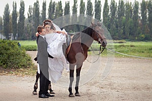 Wedding couple on horses