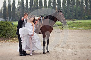 Wedding couple on horses