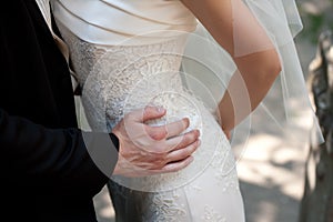 Wedding couple hugging