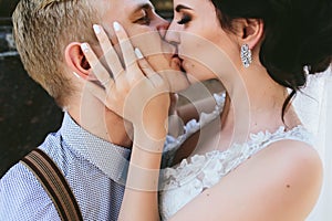 Wedding couple kiss each other