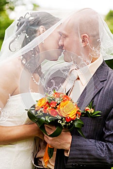 Wedding couple kissing