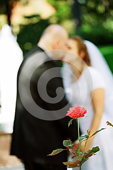 Wedding couple kissing photo