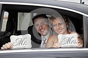 Wedding couple in Limousine