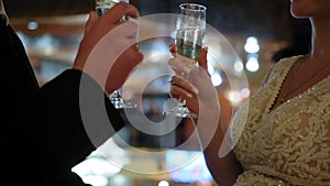 Wedding couple making a cheers with glass. Slow motion