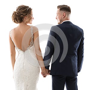 Wedding Couple Rear View, Romantic Bride and Groom Back Side, Elegant Studio Portrait in White Dress and Black Suit. Isolated