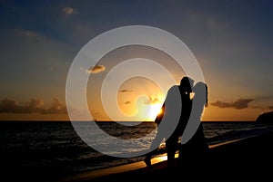 Wedding Couple silhouette on the beach at Sunset