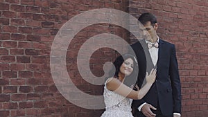 Wedding couple stands together. Lovely groom and bride. Wedding day