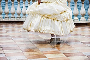 Wedding dance. Beautiful woman in white gown of the bride dance