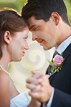 Wedding, dance and bride and groom holding hands with love, trust and solitude, security and respect. Marriage