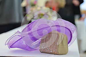 Wedding day bliss, a hat laying on the table. photo