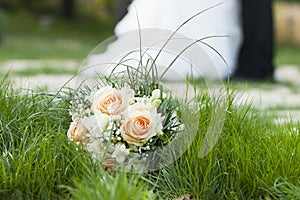 Wedding day dance, kisses and bouquet of flower