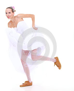 Wedding day. running bride isolated on white background