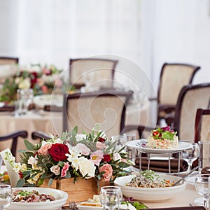 Wedding decor. Flowers in the restaurant, food on the table