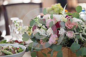 Wedding decor. Flowers in the restaurant, food on the table